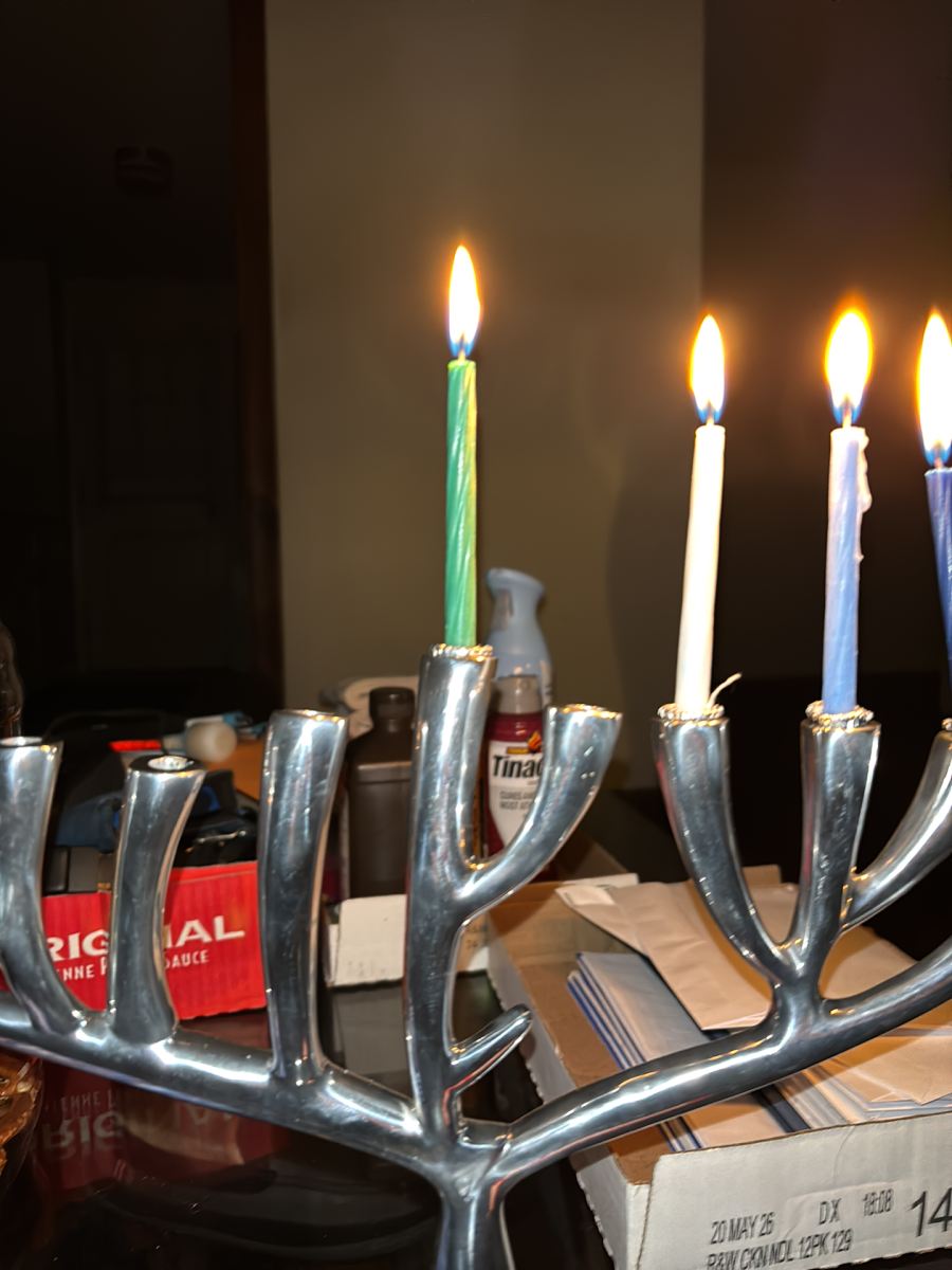 Chanukiah shaped like the Tree of Life with four lit candles