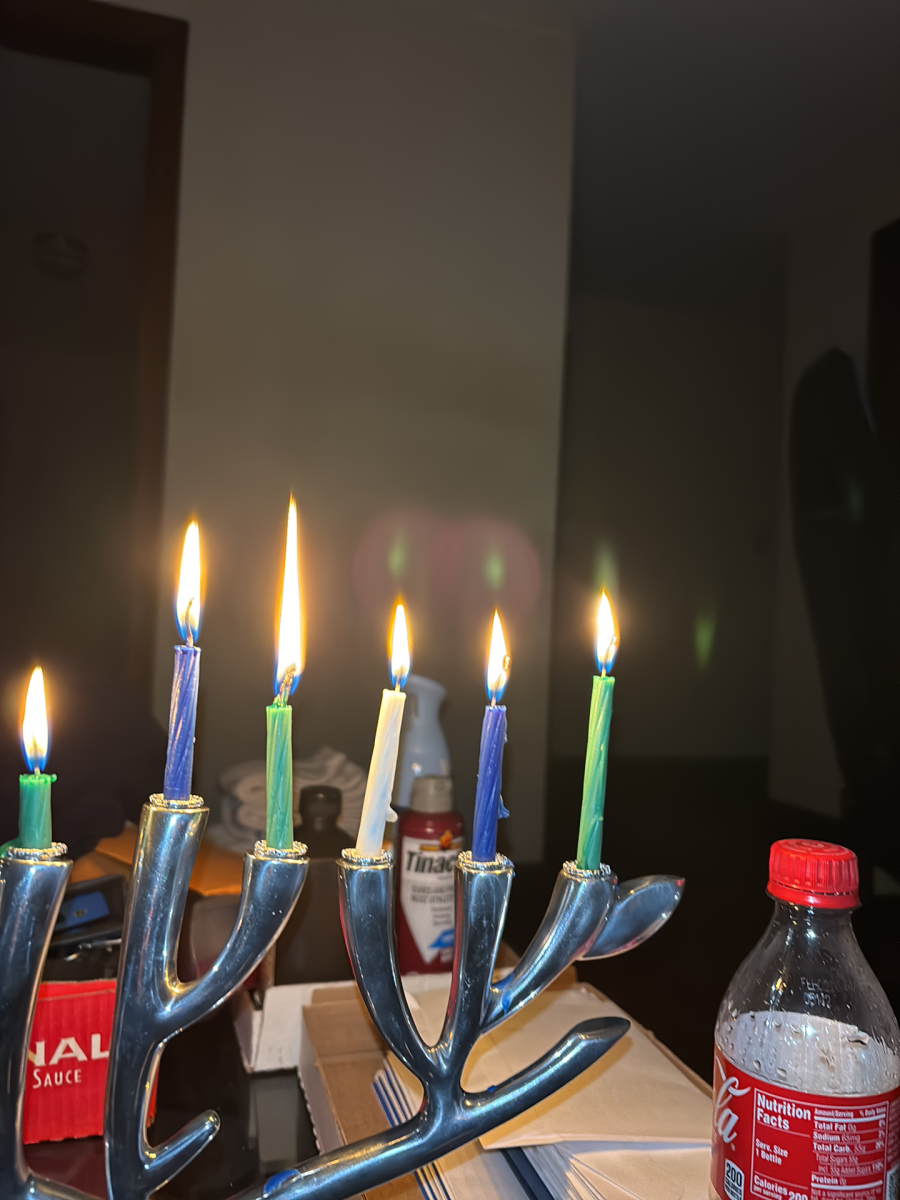 Chanukiah shaped like the Tree of Life with six lit candles